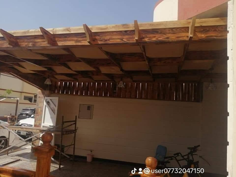مستعدون لعمل المظلات الخشب وجلسات الاستراحه والمنازل الخشب الكوخ  للاستفسار ***********

نص مكتوب في الصور:
- @user***********