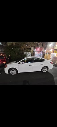 نيسان سنترا 2019 رقم بغداد انكليزي كير محرك تبريد صدر تخم تاير جديد صو...