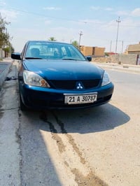 لانسر ٢٠٠٧ • محرك وكير شرط • ضرر خلفي