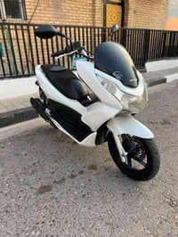 بي سي اكس جيل الاول • ١٢٥ • اوراق المعرض