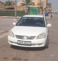 ميتسوبيشي لانسر • ٢٠١١ • بدون صبغ