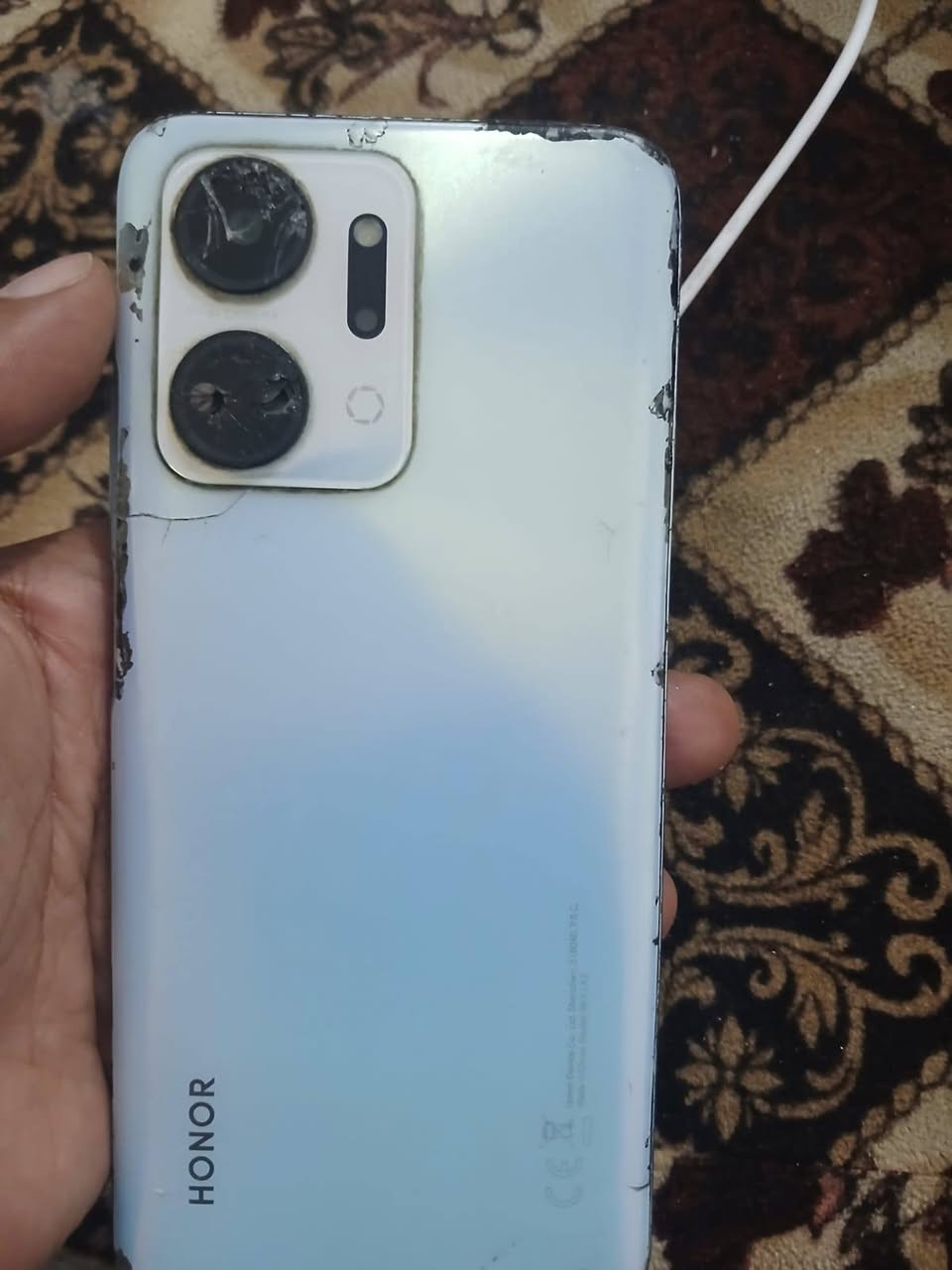 هونر x7a • موضح بالصورة • عدسات