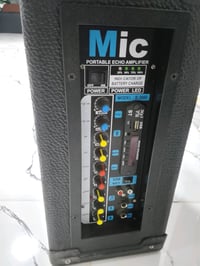 جهاز صوتي  سماعتين نوع MiC يشتغل كهرباء وشحن عطل فقط شريحه المايك الاث...