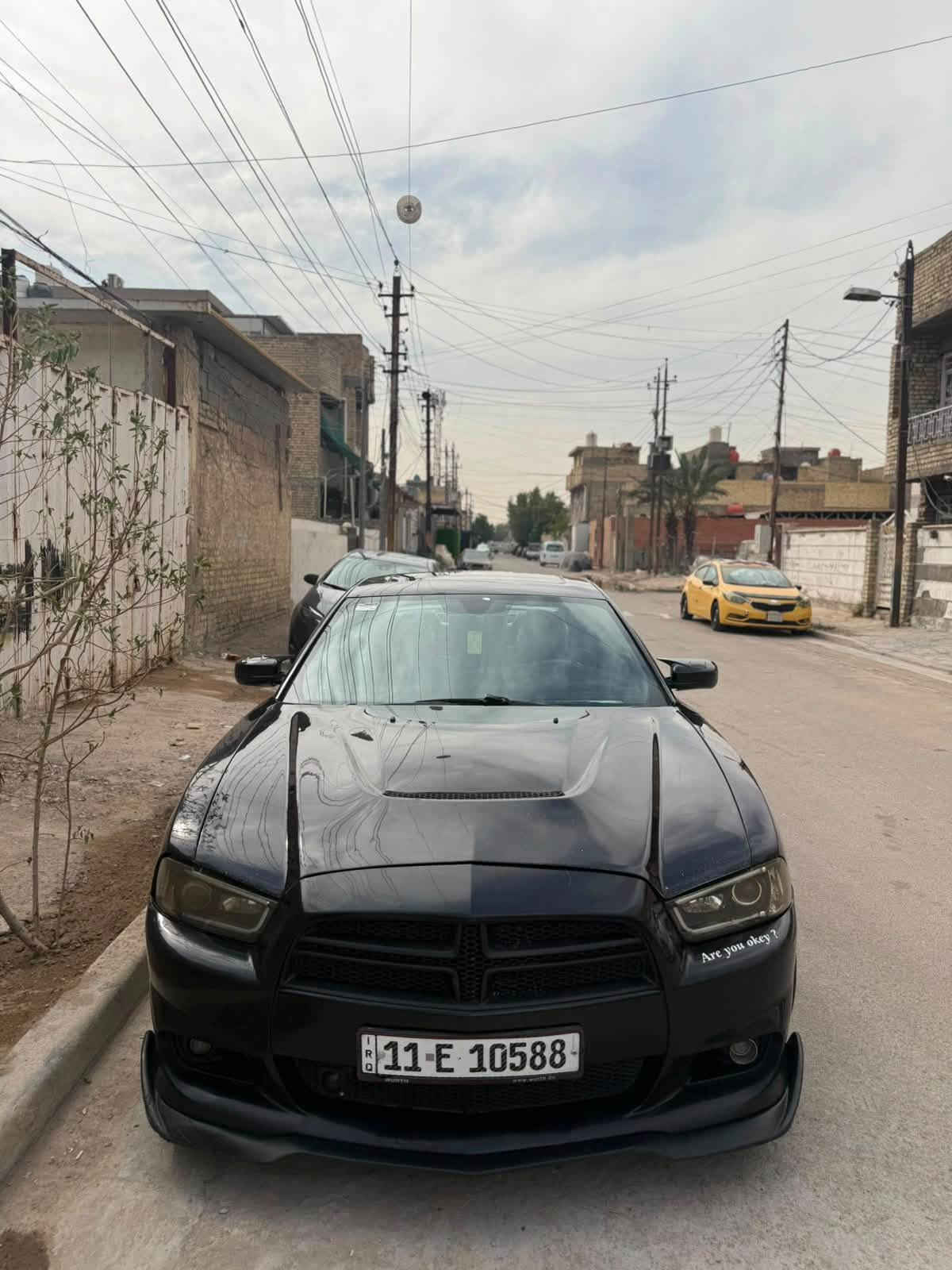 جارجر 2012 ارتي ماكس 5700
ماشيه ١٥٠ الف ميل 
داخله كلين - بلعراق  صار بيها طخه بجاملغ السايق + صبغ ٤ قطع

مكينه كير جديدات كفاله 

رقم بغداد ب اسمي 

اعلى فئة بالمواصفات 

السعر 125 ورقة 

بغداد - الامين
***********

نص مكتوب في الصور:
- Are you okey ?
- Are you okey?