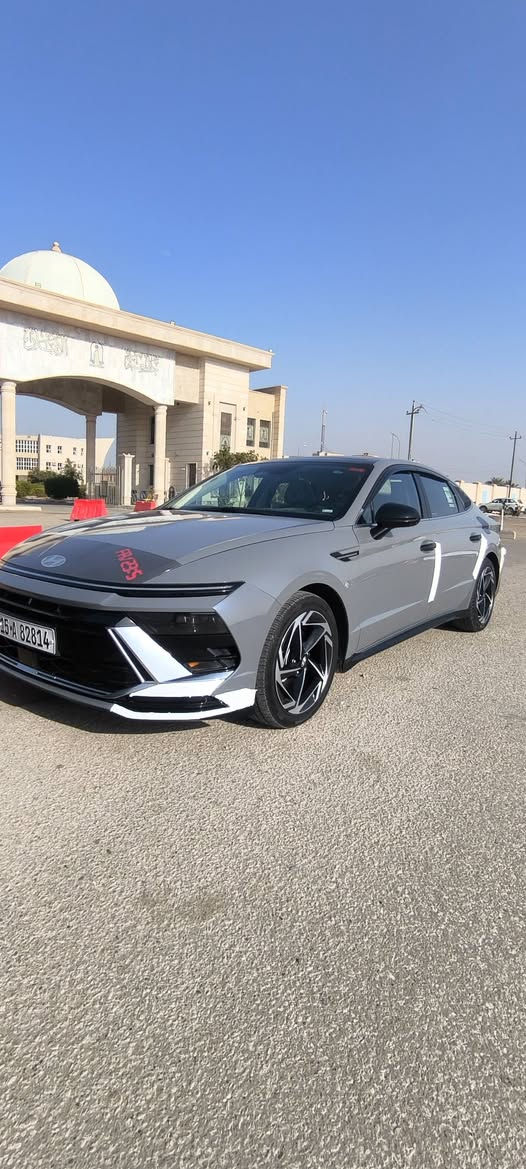 -  بدون ايرباك بدون تبديل --
سوناتا الشكل الجديد مرقمة انبار 
  وارد امريكي/ 2024 
طخة كلش بسيطه بالبنيد  ونفسه مصلح بدون فتح بدون تبديل بدون صبغ كلين كل السياره  

صور الحادث موجوده يمك 

مواصفات SEL تجي فول مواصفات  
محرك 2500
دشبول الكتروني متصل مع شاشة كاملة
أنظمة قيادة متعدد 
رادارات امامي جانبي خلفي
قيادة آليه * تحديد مسار 
لايت زينون عالي ناصي 
LED نهاري - بك لايت لد 
مانع تصادم امامي خلفي
بصمة تشغيل + بصمة ابواب + تشغيل عن بعد
كشن كهربائي
تدفئة كشنات
اوتو هولد توقف ذاتي اثناء الازدحام 
تحكمات استيرن فول
سايد بريك بصمة
صندوك ذكي + بصمة
كيرها تعليك النظام الجديد 
كامرا خلفيه دوارة وشاشة نظام ابل كار بلي
وباقي المواصفات معروفه للسيارة  
مكاني الرمادي 
***********. واتساب موجود 
عارضها ب190 مجال قليل كلش

نص مكتوب في الصور:
- 2026.08.03 09:41 POCO X6 Pro 5G 25mm f/1.7 1/940s ISO50