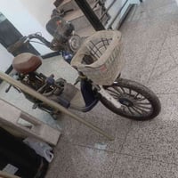 دراجة عاطلة للبيع كومة حديد وياها شاحنها وبطاريات العامرية 07766945446