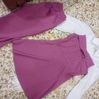 اي قطعة • ملابس
