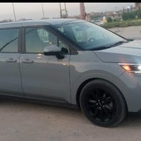 كيه كرنفال وارد امريكي للبيع المديل 22  اللون سمنتي أربعة كامرات حساسا...