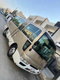 ٢٠٠٤ • بنزين وغاز • باسمي