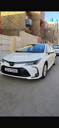 كورلا هايبرد بغداد ٢٠٢٥ تحويل مباشر بأسمي فول مواصفات  عداد المسافه ١٧...
