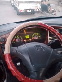 كيا بنكو رقم بغداد بسمي موديل ٢٠٠٦ مكينه مسكر طربه ميكانيك شاصي مكفوله...