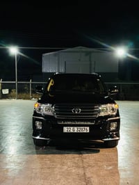 اخوان لاندكروز VXR موديل 2012  محرك V8  5700 ماشية ١٦٦ كيلو فتحة سقف ،...
