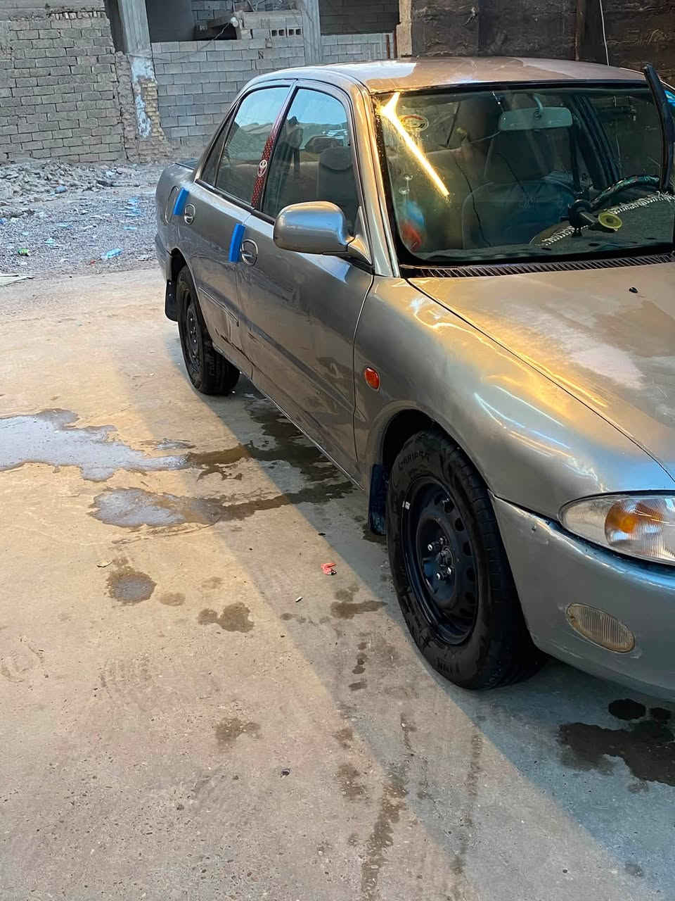 بروتون موديل 2002 كير عادي رقم بغداد بأسمي تحويل ثاني يوم كلشي بيها شغال ما عدا التبريد ب38 وبيها مجال قليل التفاصيل اتصل على هذا الرقم ***********
