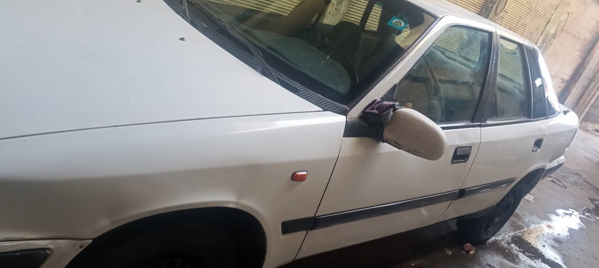 ١٩٩٥ • باسمي • كوبون بنزين