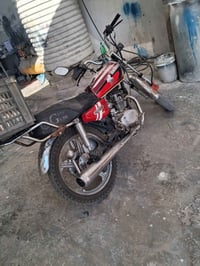 موديل ٢١ • دراجة • متذب عليه