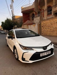 كورلا هايبرد الشكل الخليجي فول مواصفات  السيارة مغلفة ارضيتها جلد وضاي...