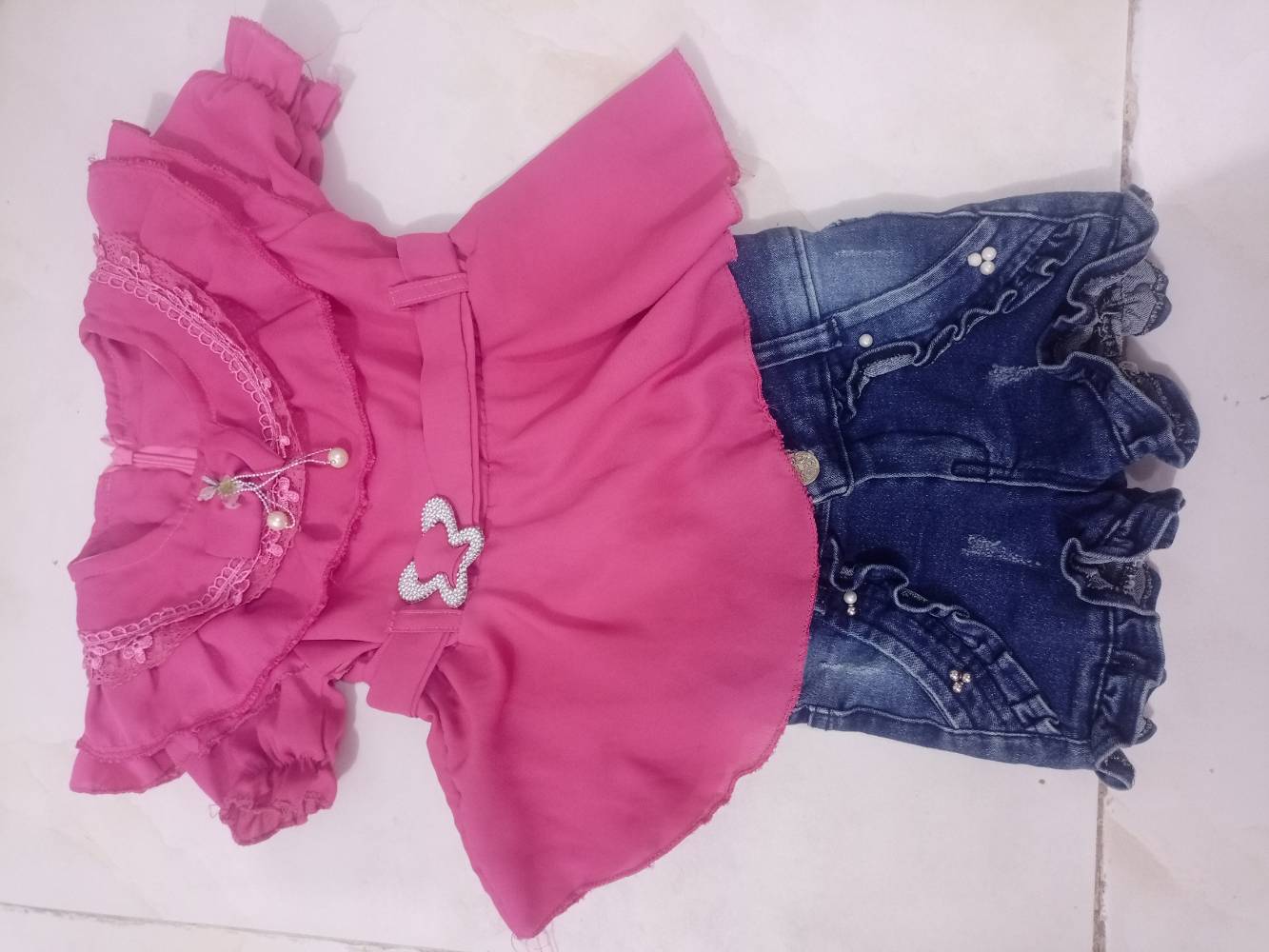 ملابس بنات • النجف