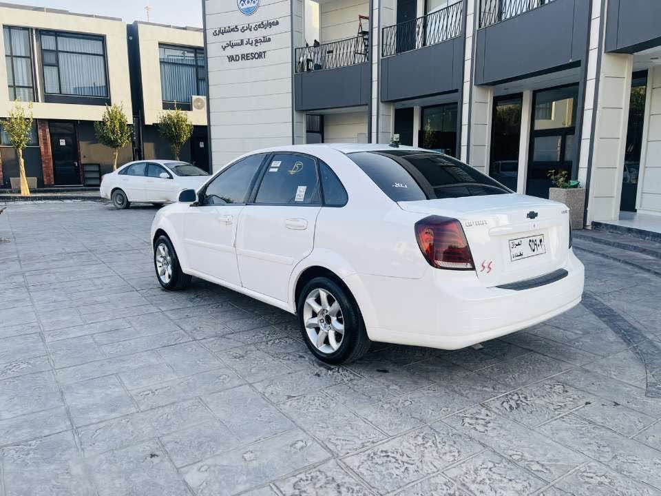 سەرەتا بەناوی خوودا 
ئۆپترا مۆدێل ٢٠٠٥ ئارم پلاستیک هەولێر بەشەرت ئارمو ئەوەلیات هەموو گیانی بەشەرت پارچەو نیوێکی بۆیاخ هەیە بێ لێدراو جام کارەبا گێڕ عادیە سەیارەکە تا بڵێی جوانو پاکە هی گەنجان بوە کامل جوانکاری بۆ کراوە بەگلایتی مارسلیسی بۆ دانراوە ٤ ویلو تاییەی ئینفنیتی لۆکی لە ژێرە تەقەو ڕەقە گێڕ مەکینە کارەبای موسو بڕاوە ئارمو ئەوەلیات بەشەرت سەیارەکە ٢٥٠ مەسرەفی نییە تەبریتو کارەبای گشت ئیش دەکات زۆر پاک ماوەتەوە 
شوێن کۆیە 
***********
*********** كويسينجاك, أربيل
