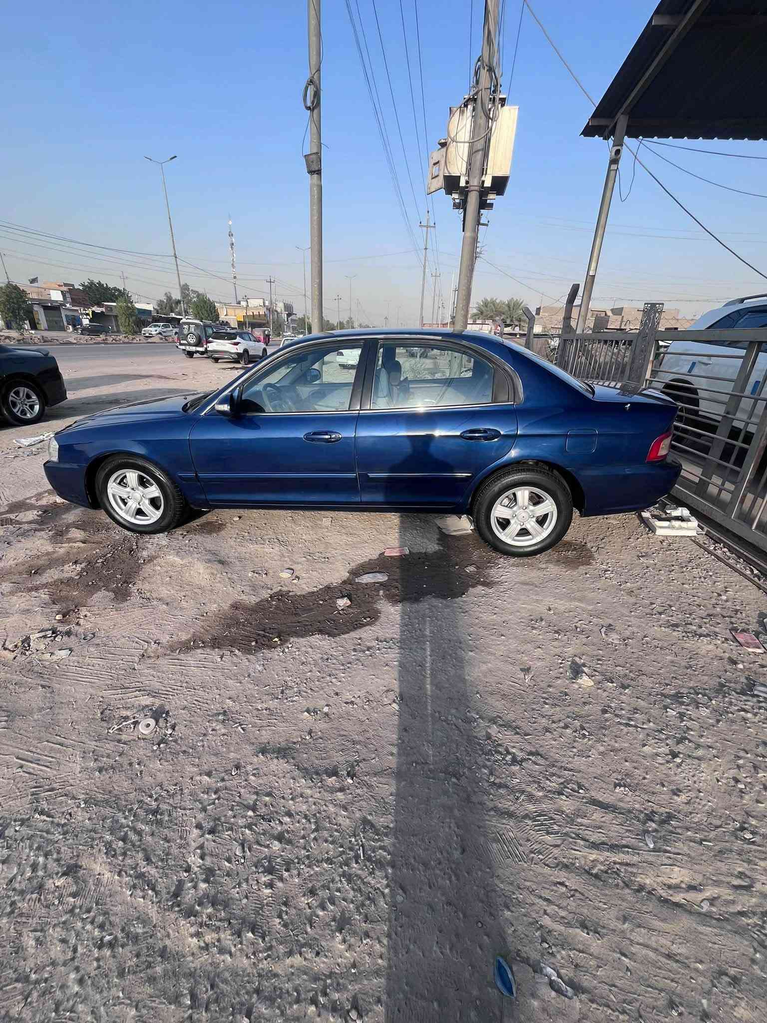 السلام عليكم اوبتما 2005السياره رقم بغداد  السياره كفاله من ضربه وخياس مصبوغه عام جماليه دوسات بل جيس مكينه كير حداديه تبريد تخم تاير كله جديد تحكم استرين اشاير ترحيب السعر 63وبيها مجال مكاني بابل
