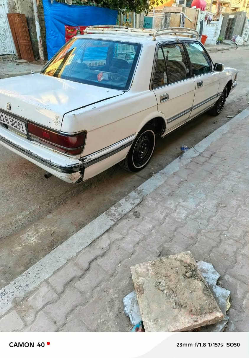 السلام عليكم سيدان موديل 90 رقم بغداد مكان السيارة بغداد السعر 40رقم تليفون ***********
