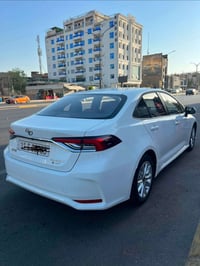 كورلا هايبرد موديل ٢٠٢٥ كفاله بوضع الزيرو ماشيه (٨) الف  فول مواصفات ب...