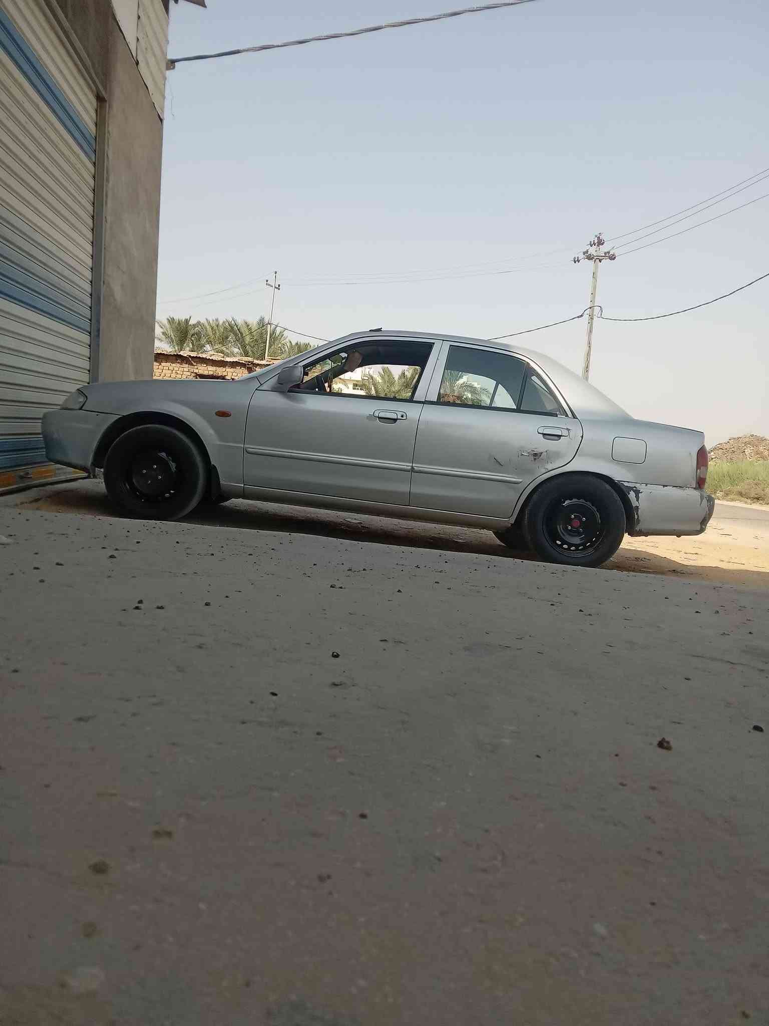 سلام عليكم سياره مازدا 323 مديل 1999سنويه ل30باسمي هزه بعده مصاقطه مكينه وكير زينات ومابيه ضربه قويه شواصي كفاله السعر38   مكان نجف  التواصل   *********** واتساب
