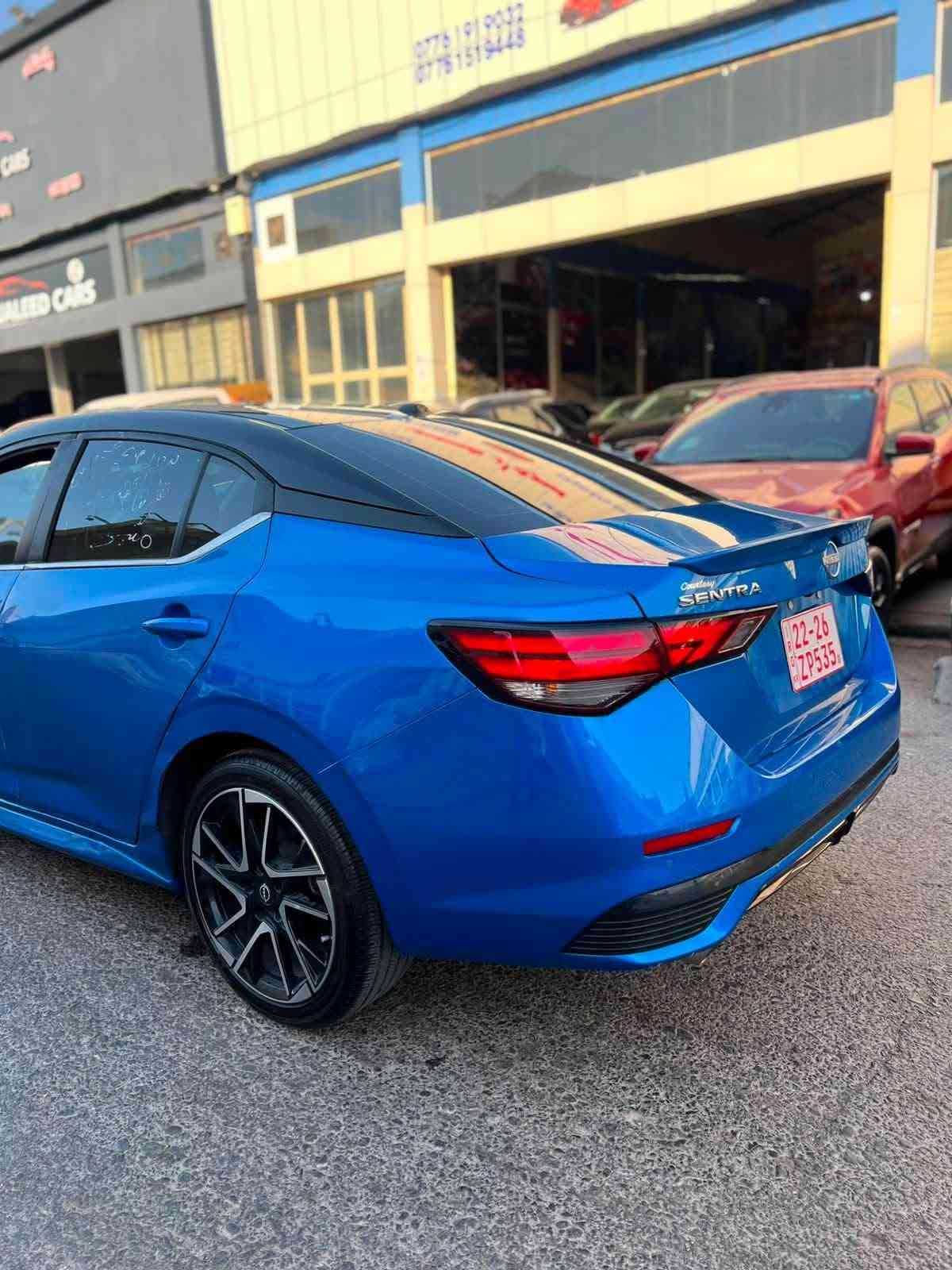 نيسان سنترا SR 2025 ماشية ١٨ 
سقف اسود بلاد فول مواصفات كشن هيتر لايت زينون سقف اسود ويل كروم ١٨ بصمة رادارت حساسات كير محرك تبريد كلها شرط كاتي تترقم اربيل سليمانية بيها تبديل باب بلاد نفس اللون وباب جملغ امامي صبغ مع حافة بونيد بجم خلفي كبس راديترات لايتات بلاد شرط الفحص مكان سيارة كركوك شراي اتصل واتس اب موجود *********** كركوك, العراق

نص مكتوب في الصور:
- ***********
- ***********