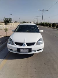 لانسر ٢٠١١ • بدون صبغ • توماتيك