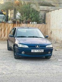 بيجو ٣٠٦ • بدون صبغ • رقم بغداد