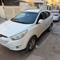 توسان ٢٠١٢ خليجي  محرك ٢٠٠٠  رقم بغداد  قطعة وحدة صبغ (بنيد) بدون دواخ...