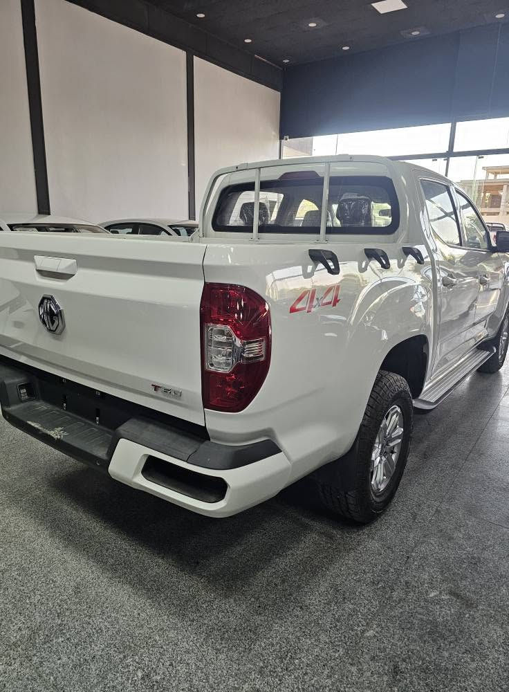 ئێم جی پیکەب  MG T60 2025
سفر كيلومتر. ضمان شركة 3 سال
مواصفات گير عادي. دبل اكسل 
گير و مكينه قزافى مسيوبوشى 
شاشه گه وره تبريد لمس بلاجكتور 
ويل كروم. ئاوينه إشارەت بلوتوس.
سعر 150 ورقە   موبایل  ۰۷٥۰۲۲۲۰۰۱٥
مکان اربیل معرز توب کارس أربيل, العراق
