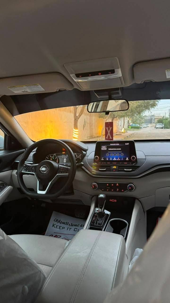 نيسان التيما 2023  sv بدون حادث السيارة محتركة غرفتها مبدله الغرفة كلها كهربائياتها مكفولة كلها بلادي ما تضررت بالحرق  وبيها صبغ الكصة مال قمارة المواصفات محرك 2500 بصمة تشغيل و ابواب رادارات 360 درجة تحكمات ستيرن شاشة ابل كار بلي اندرويد اوتو كامرة حساسات خلفية توقف ذاتي رقم بغداد مكاني بغداد البلديات للبيع او مراوس بفورتي او النترا  السعر (135) ***********

نص مكتوب في الصور:
- 1N4BL4DV0PN337736 1-82757114 Copart 87 4G 1:49 Location: Tulsa (OK) Shipping from: Houston (TX) Seller: Hertz Sale Document: Certificate of title-junked (OK) Sales History 2 Similar archival offers You are watching archived offer. Auction ended on Friday, January 17, 2025. Friday, January 17, 2025 12 Photos Bidding Vehicle information bid.cars