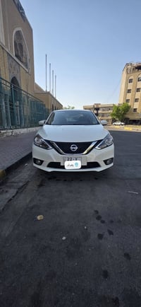 نيسان سنترا 2025  ماشيه 15 الف  رقم اربيل  سنويه بأسمي  بدون حادث فقط ...