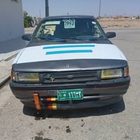 مازدا ٣٢٣ • موديل ١٩٩٠ • مكينة بخ