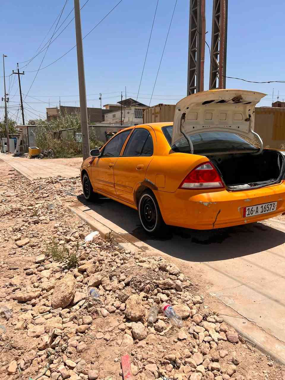 سلام عليكم نيسان صني مديل ٢٠١٢  بسمي رقم نكليزي مصفره هيه وغرامات تبريد ثلج منضومه جديده بيه جاملغ امامي مبدل بس وتلكيطات سعر ٧٥ رقم ***********  مكاني دوانيه حي الجزئر
