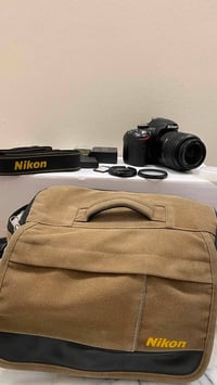 نيكون D3200 • عدسة 18-55 • شتر ١٧٠٠٠