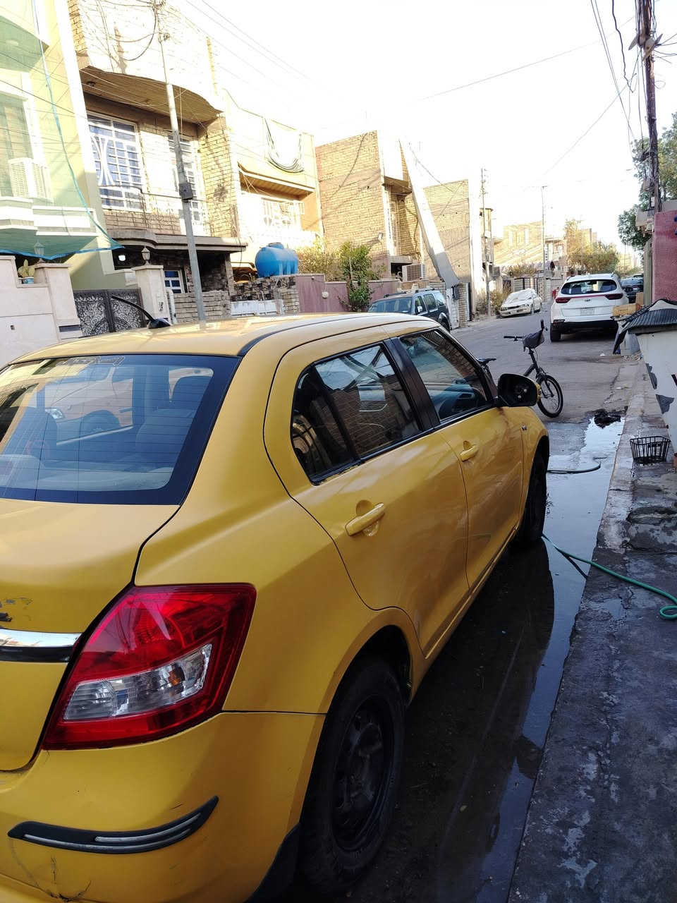 سازوكي سويفت صفره بغداد  ٢٠١٤ محرك ١٤٠٠ محرك جديد حاوية بيها ضربة بدعامية ومبدلة السعر ٦٠ رقم *********** مكاني بغداد
