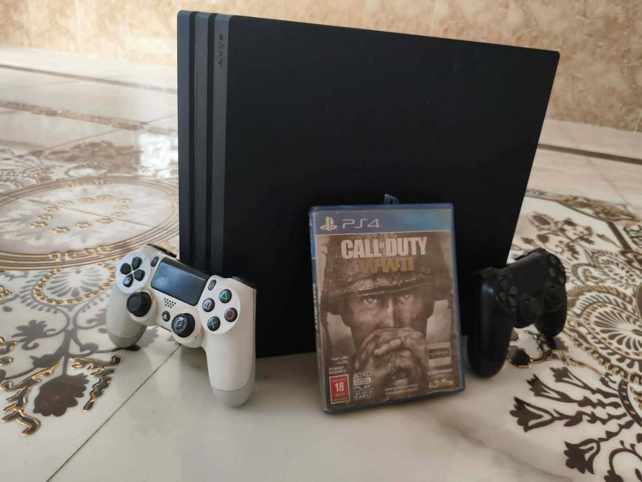 جهاز PS4 Proمستعمل يحتاج الى تبديل المعجون واليدات عطلانات ويا قرص شغال call of duty الحرب العالميه الثانيه السعر 300 وبي مجال العنوان الديوانية التقيه 
للاستفسار واتساب ***********
