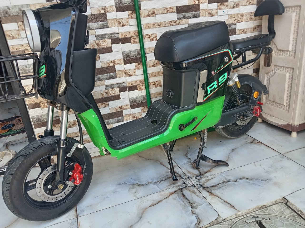 دراجه شحن للبيع نوع R9  مكان بغداد بدون بطاريات السعر 350 بيها مجال قليل ***********
