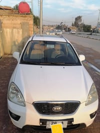 كيا كارنز • ٢٠١٢ • رقم نجف