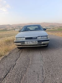 مازدا ٨و • ١٩٩١ • نوافذ كهربا