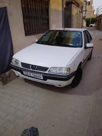 بيجو 405 • موديل ٢٠١٣ • رقم نجف