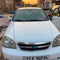 شفروليه أوبترا 2012 رقم بغداد دولي باسمي مبدل جاملغ وبيها  ضربة بسيطة ...