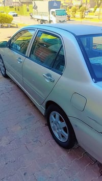 لانسر ميسبوشي 2008 محرك 1600 صبغ احزام باسمي تحويل ثاني يوم  مكان حي ا...