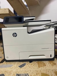 طابعة HP 57750 • عداد ٢٠٠٠٠٠ • الموصل