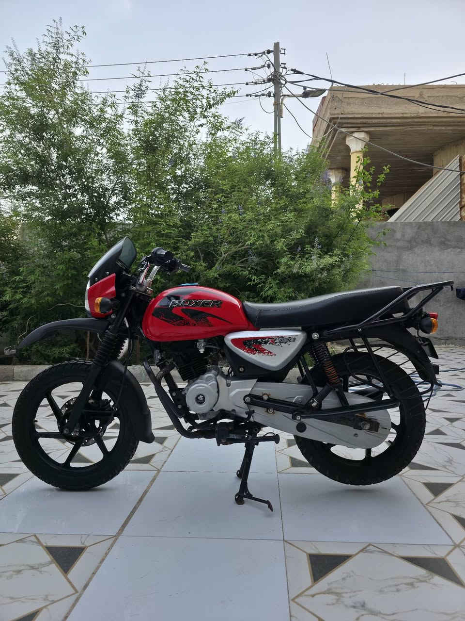 دراجة بجاج بوكسر 150cc 
موديل : 2022
​النوع: فحل جبلي
​سعة المحرك: 150cc
​الموديل: 2022 (نزول 2022/5/26)
​الممشي: 5,700 كم
​الاستخدام: شخصي
​الأوراق: 7 أصلية (بأسمي)
​الموقع: البصرة / كرمة علي
​السعر: 1,750,000 د.ع (قفل)
​للتواصل: ***********
