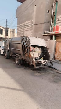 كابسة نفايات • بصره • جواز العمل