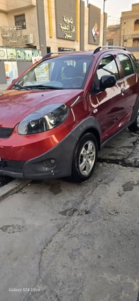 شيري X1 ٢٠١٤ رقم بغداد الدولي مكفولة من الضربة والصبغ فقط جراد بالبنيد...