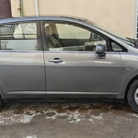 نيسان تيدا موديل 2006رقم نجف انكليزي سياره جاهزه من كلشي  السعر/67 ورق...