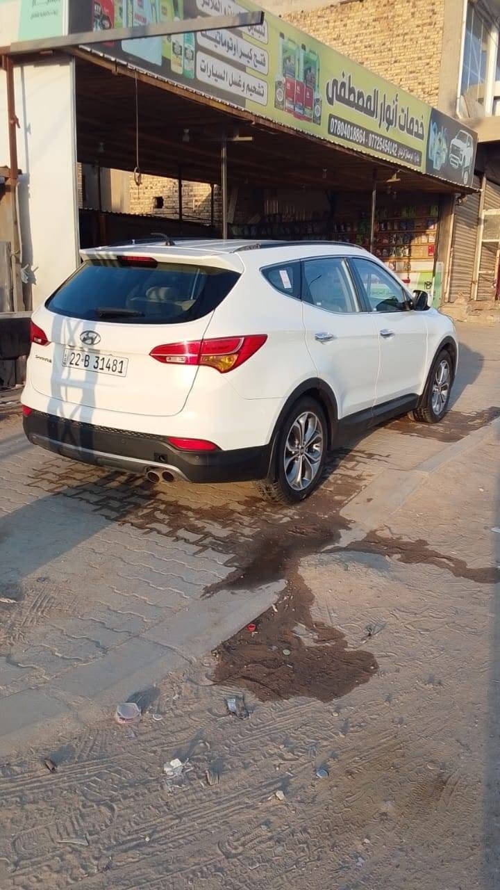 سنتافي ٢٠١٣ وارد خليجي كفالة كير ومحرك رقم أربيل باسمي بيها طخات بالبنيد حسب ما موضح بالسونار تبريد ضعيف السعر ١٤٠& وبيها مجال الاتصال على الرقم ***********
